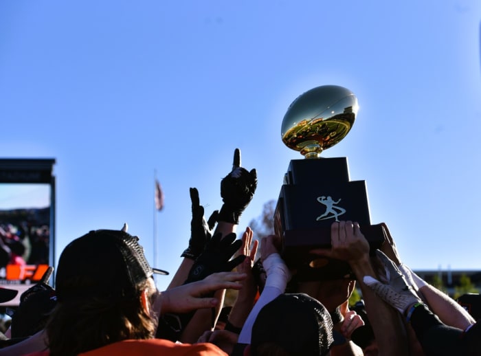 Fairview players celebrate after receiving the Class A state championship trophy Dec. 9, 2023.